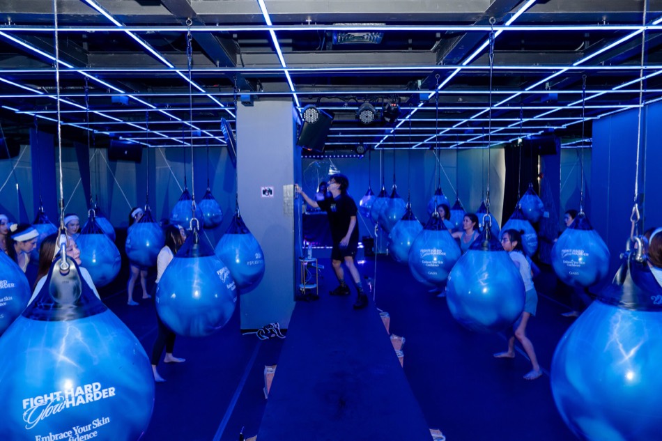 Group class at SPLASH BOX (dark-room beat boxing)